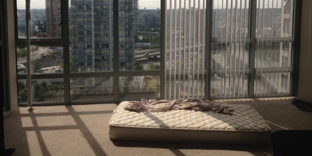 Empty Apartment Overlooking Big City