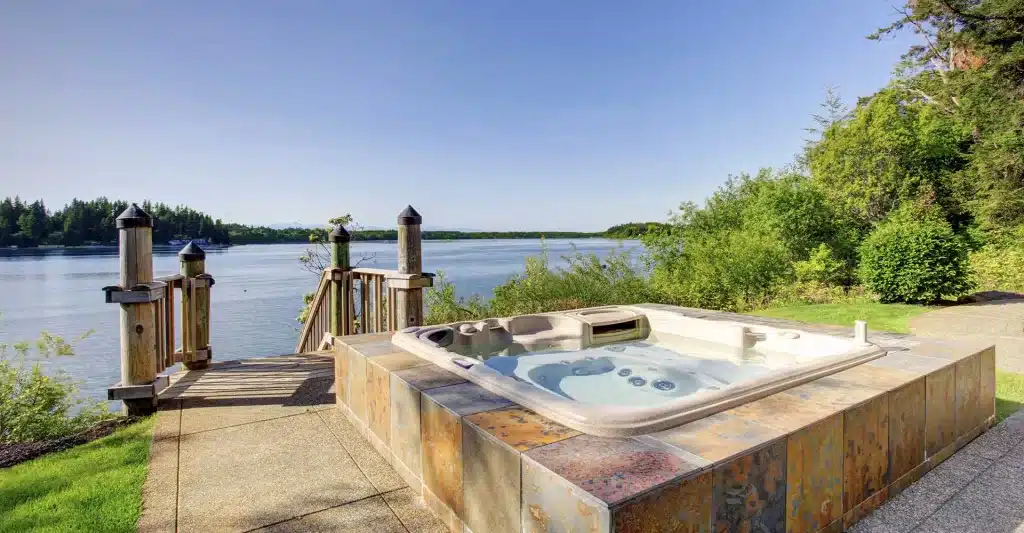 A Hot Tub On A Stone Patio